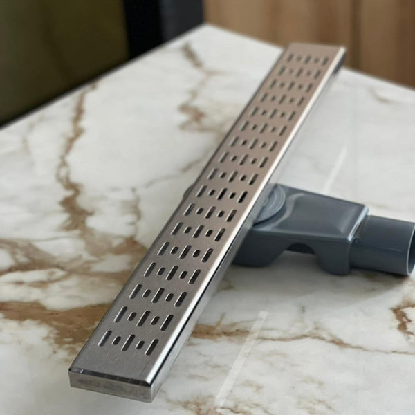stainless-steel-shower-drain-hollow-face--60-cm-with-a-drain