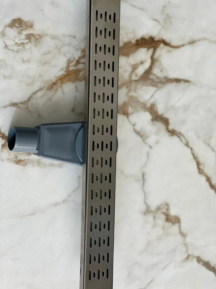 stainless-steel-shower-drain-hollow-face--60-cm-with-a-drain